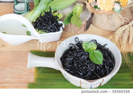 black noodles with pork and dumpling delicious black noodles with pork and dumpling delicious 38560588