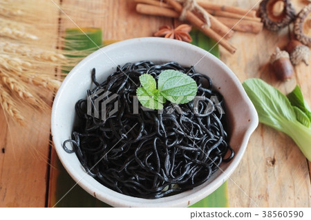 black noodles with pork and dumpling delicious black noodles with pork and dumpling delicious 38560590