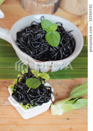 black noodles with pork and dumpling delicious 38560592