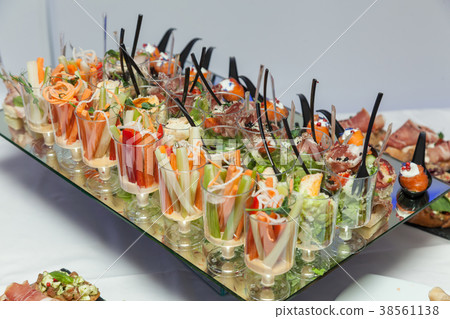 Canape for a buffet table, appetizer. 38561138