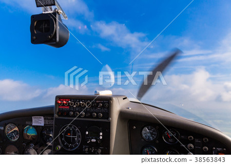 Sky and dashboard of private sport plane 38563843
