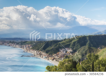 Giardini Naxos with the Mount Etna. Sicily, Italy. Giardini Naxos with the Mount Etna. Sicily, Italy. 38564236