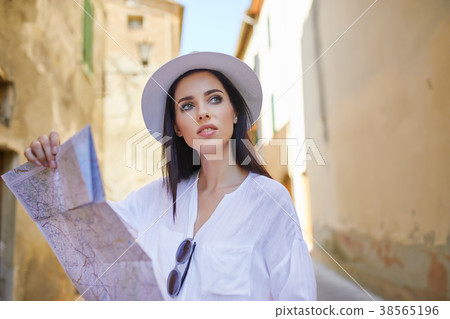 woman looking at a map 38565196