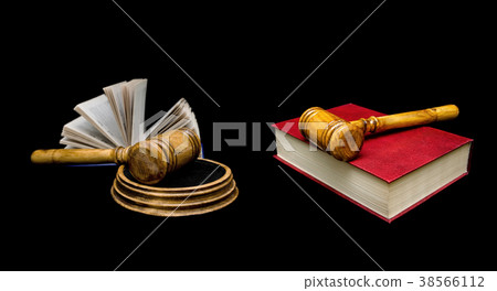 Judge's hammer and book on a black background Judge's hammer and book on a black background 38566112