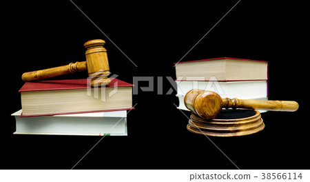 Wooden judge hammer and book on a black background Wooden judge hammer and book on a black background 38566114