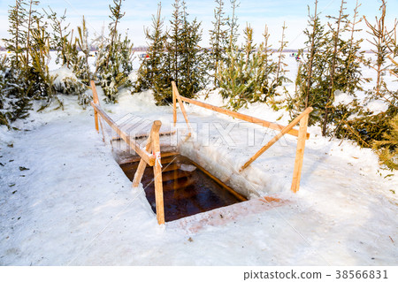 Ice hole for traditional winter swimming Ice hole for traditional winter swimming 38566831