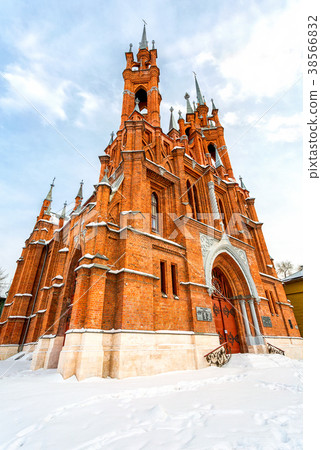 Roman Catholic church in wintertime 38566832