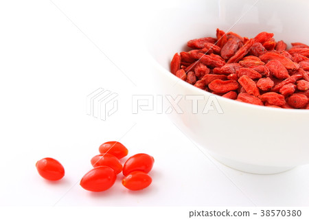 dried goji berries in a small white bowl 38570380