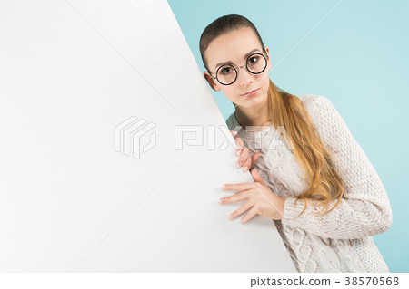 Attractive young woman with blank banner 38570568