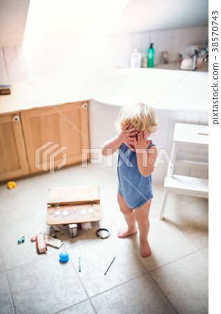 Toddler boy in a dangerous situation in the Toddler boy in a dangerous situation in the 38570743