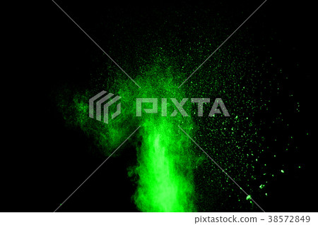 abstract green dust explosion on black background abstract green dust explosion on black background 38572849