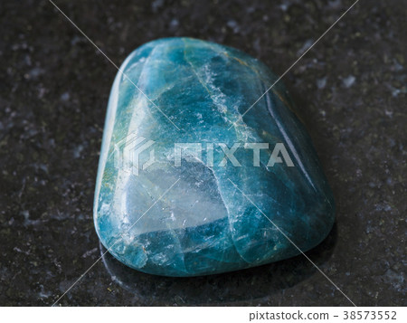 tumbled green blue Apatite gemstone on dark tumbled green blue Apatite gemstone on dark 38573552