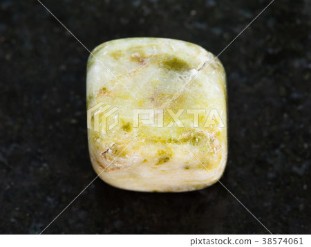 polished agate gem stone on dark background 38574061