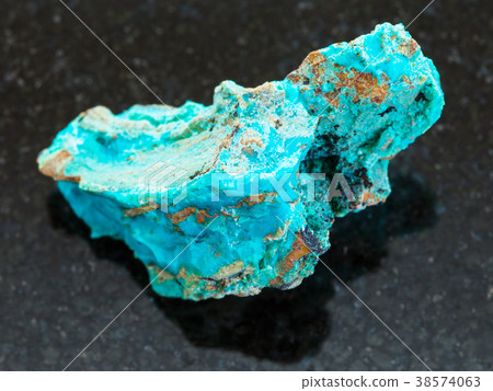 Chrysocolla stone on dark background 38574063