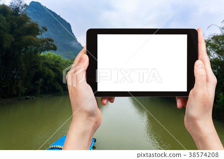 tourist photograps river in Yangshuo county 38574208