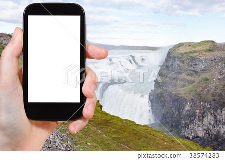 tourist photographs Gullfoss waterfall in canyon tourist photographs Gullfoss waterfall in canyon 38574283
