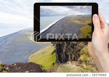 tourist photographs Solheimafjara coastline 38574668