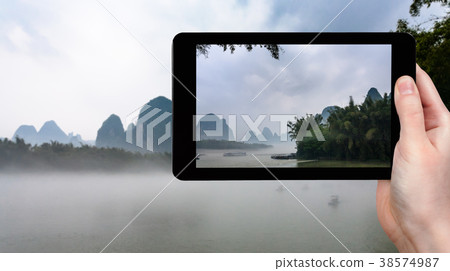 tourist photographs fog over river in China 38574987