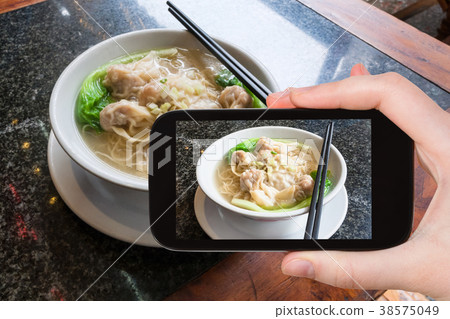 tourist photographs local chinese soup Dim sum 38575049