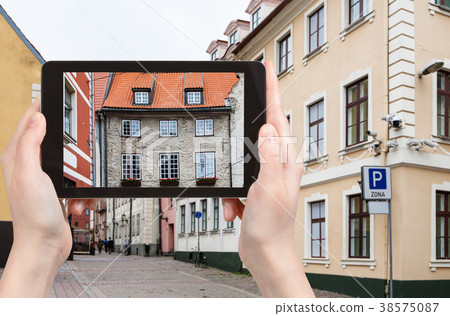 tourist photographs house in Riga ciity 38575087