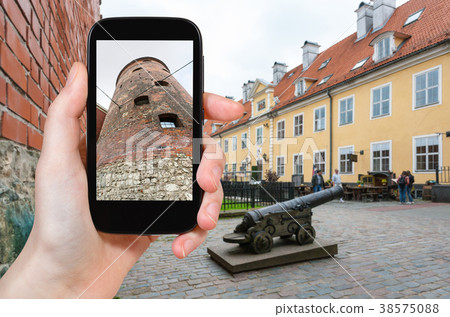 tourist photographs Powder Tower in Riga city 38575088