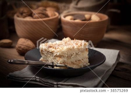 Homemade cake with ground walnut and coconut. Homemade cake with ground walnut and coconut. 38575269