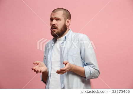 Let me think. Doubtful pensive man with thoughtful 38575406