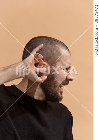 The Ear ache. The sad man with headache or pain on 38575471