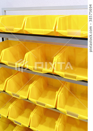 Yellow plastic racks Yellow plastic racks 38575694