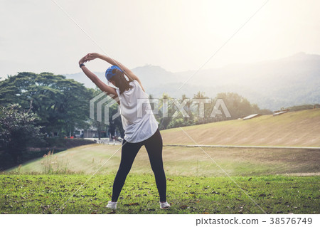 Attractive young muscular women, Athletic woman doing some stret Attractive young muscular women, Athletic woman doing some stret 38576749