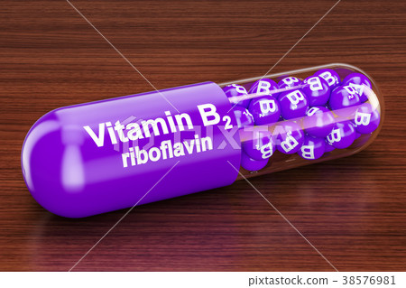Vitamin capsule B2 on the wooden table - Stock Illustration [38576981 ...