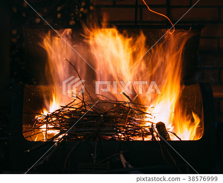 Burning firewood and branches for coal, long Burning firewood and branches for coal, long 38576999