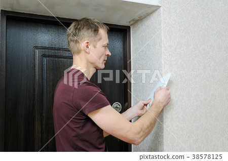 Glueing wallpapers at home. Glueing wallpapers at home. 38578125