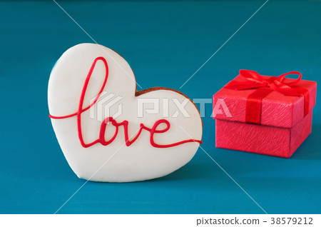 St. Valentines Day red gift box with bow and St. Valentines Day red gift box with bow and 38579212