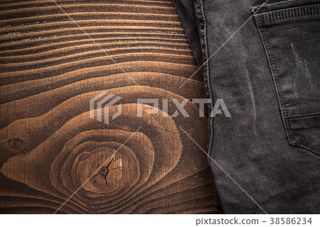 Black jeans trousers border background Black jeans trousers border background 38586234