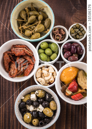 Selection of tapas in ceramic bowls Selection of tapas in ceramic bowls 38586376