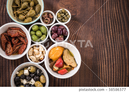 Selection of tapas in ceramic bowls Selection of tapas in ceramic bowls 38586377