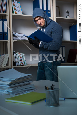 Young man in industrial espionage concept Young man in industrial espionage concept 38586700