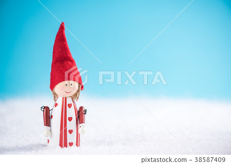 Vintage wooden Christmas toy in snow 38587409