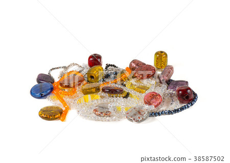 Four balls of colored wool skewered  38587502