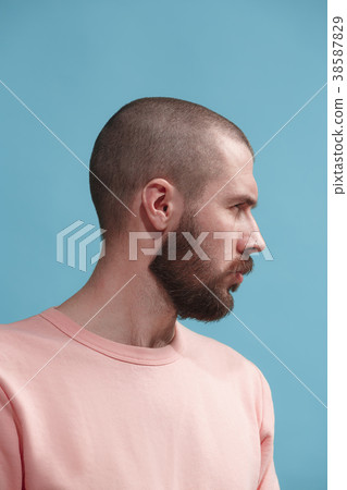 Suspiciont. Doubtful pensive man with thoughtful 38587829