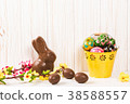 Easter chocolate bunny and eggs on white wooden  38588557