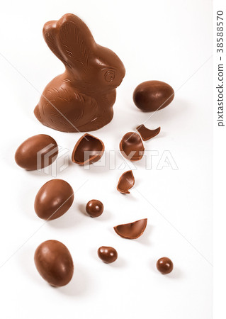 Easter chocolate bunny and eggs on white wooden Easter chocolate bunny and eggs on white wooden 38588570
