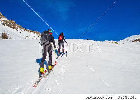 Two girls in the woods with mountaineering Two girls in the woods with mountaineering 38589243