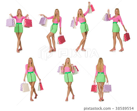 Woman with shopping bags isolated on white Woman with shopping bags isolated on white 38589554