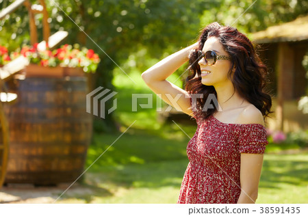 Young woman on the background of the Italian house Young woman on the background of the Italian house 38591435