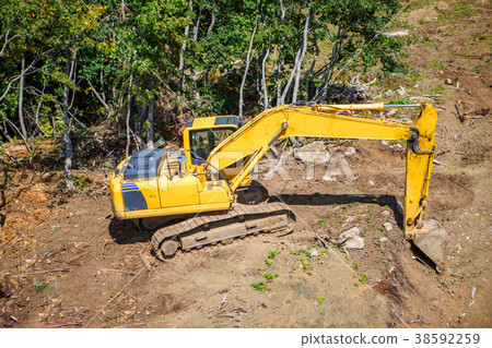 Photo of working excavator on summer day Photo of working excavator on summer day 38592259