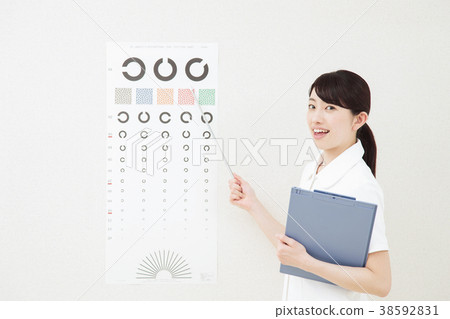 Vision test woman ophthalmologist nurse 38592831