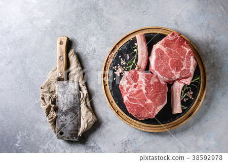 Raw tomahawk steak 38592978