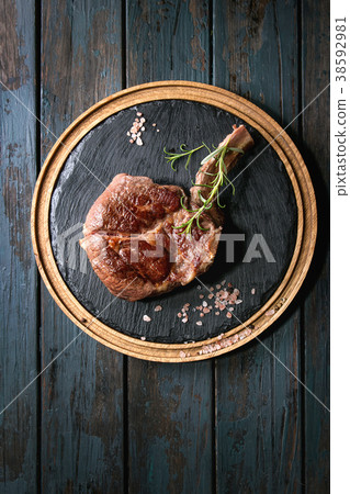 Grilled tomahawk steak 38592981